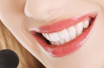 牙龈疼牙齿松动是什么原因_牙龈萎缩导致牙齿松动怎么办