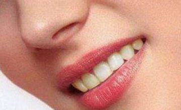 拔牙后牙龈有白色物体_拔牙手术后牙龈起水泡