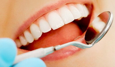 刮治后牙齿松动多久可以改善_后牙齿断了一半怎么处理最好