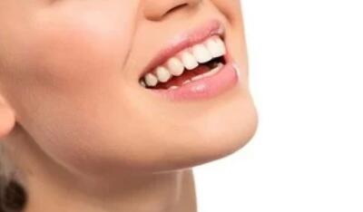 成年女性下面牙齿多少颗_成年女性牙齿松动是什么原因