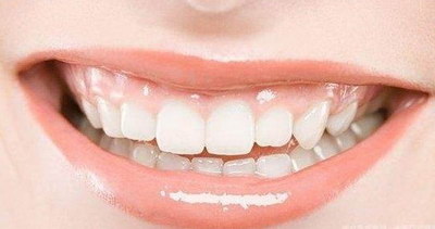 拔牙后口腔里有白色的凸起是什么
