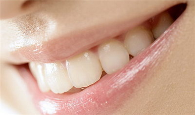 大门牙松动可以做牙齿矫正吗